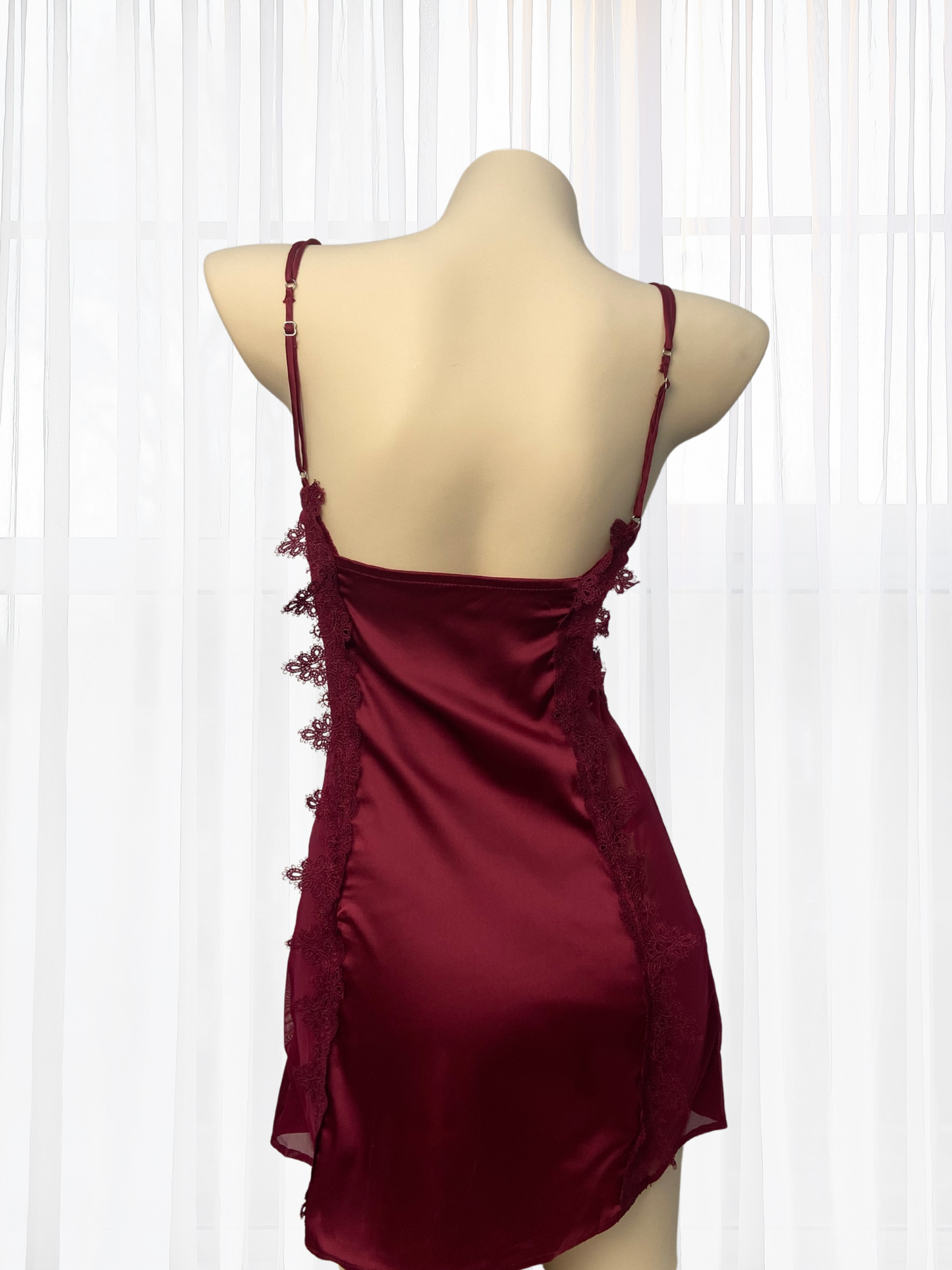 Wonder 18 Romy Satin Babydoll with robe. It brings playful lightness to evenings, its sheer silhouette moving with a quiet fluidity.