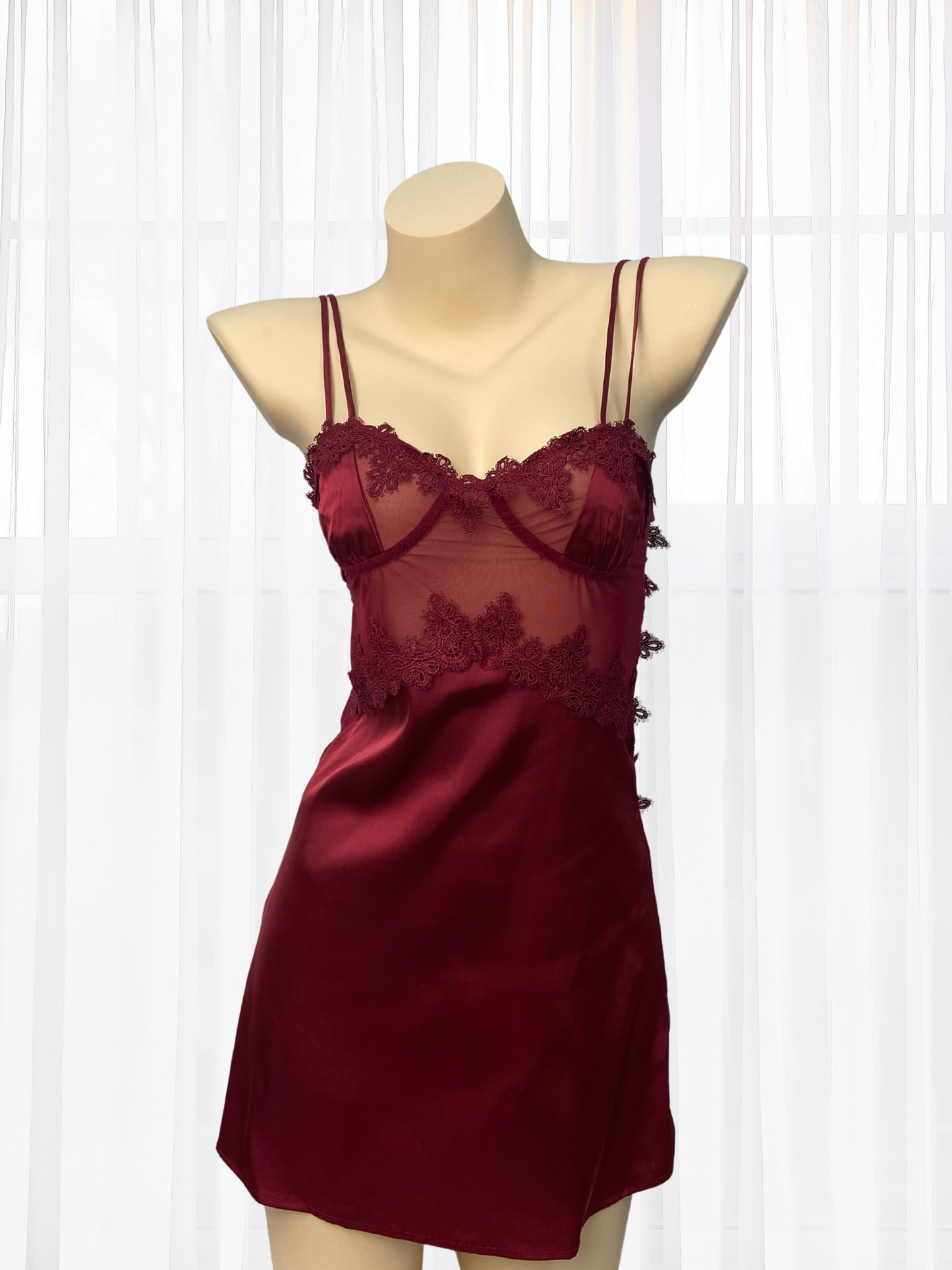 Wonder 18 Romy Satin Babydoll with robe. It brings playful lightness to evenings, its sheer silhouette moving with a quiet fluidity.