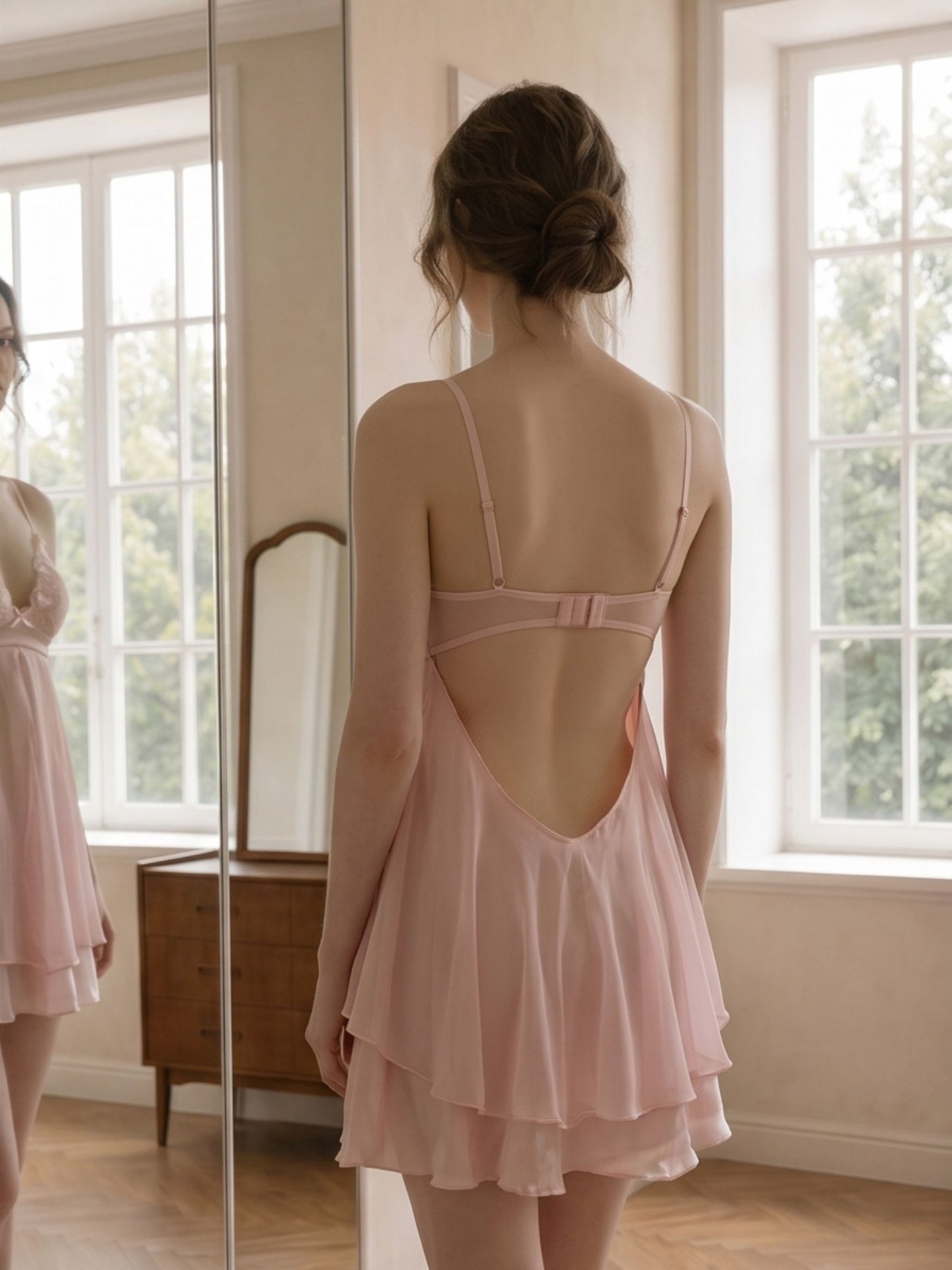 Wonder 18 Evelyn Babydoll features soft padding and double layer skirting with flowy satin dress.