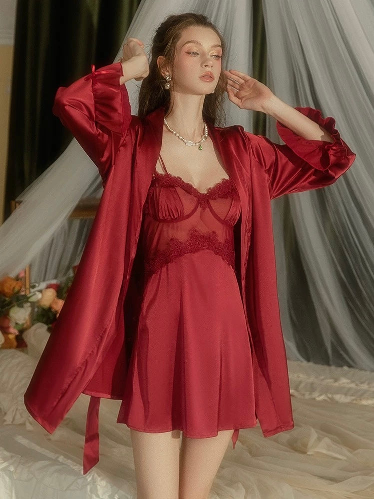 Wonder 18 Romy Satin Babydoll with robe. It brings playful lightness to evenings, its sheer silhouette moving with a quiet fluidity.